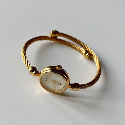 Gucci 1990s Seashell Dial Gold Plated Cable Bangle Watch