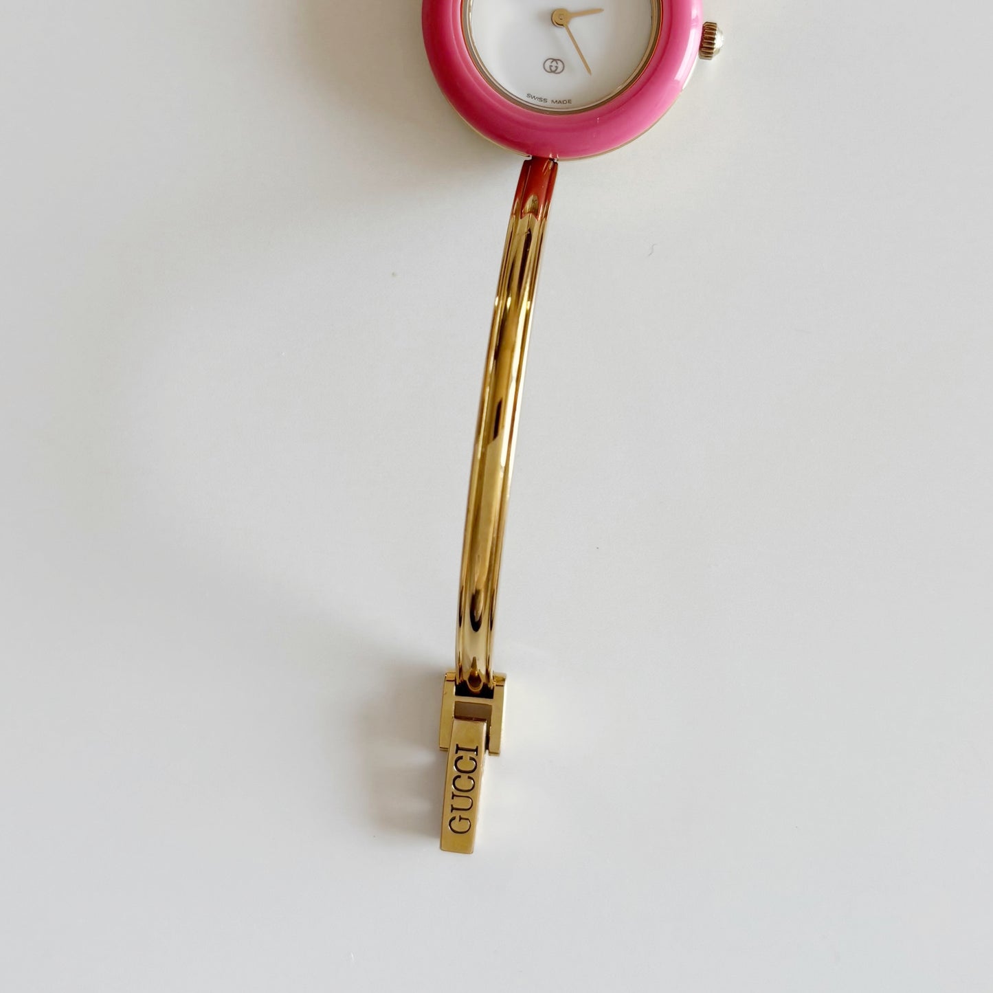 Gucci 1990s Interchangeable Bezel Gold Plated Bangle Watch with 12 bezels, case