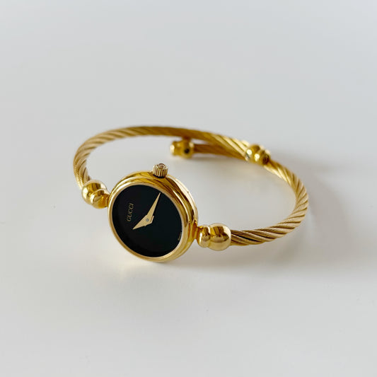 Gucci 1990s Black Dial Gold Plated Cable Bangle Watch