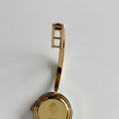 Gucci 1990s Interchangeable Bezel Gold Plated Bangle Watch with 12 bezels, case
