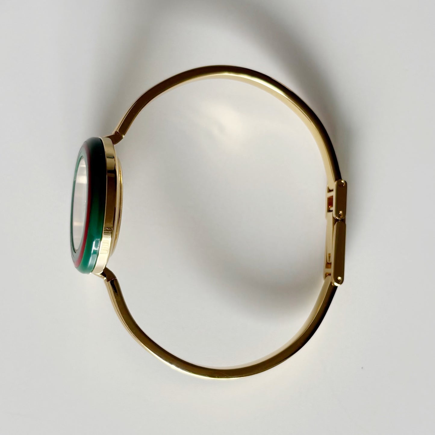 Gucci 1990s Interchangeable Bezel Gold Plated Bangle Watch with 12 bezels, case