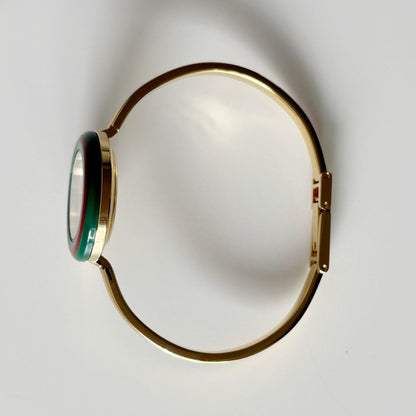 Gucci 1990s Interchangeable Bezel Gold Plated Bangle Watch with 12 bezels, case