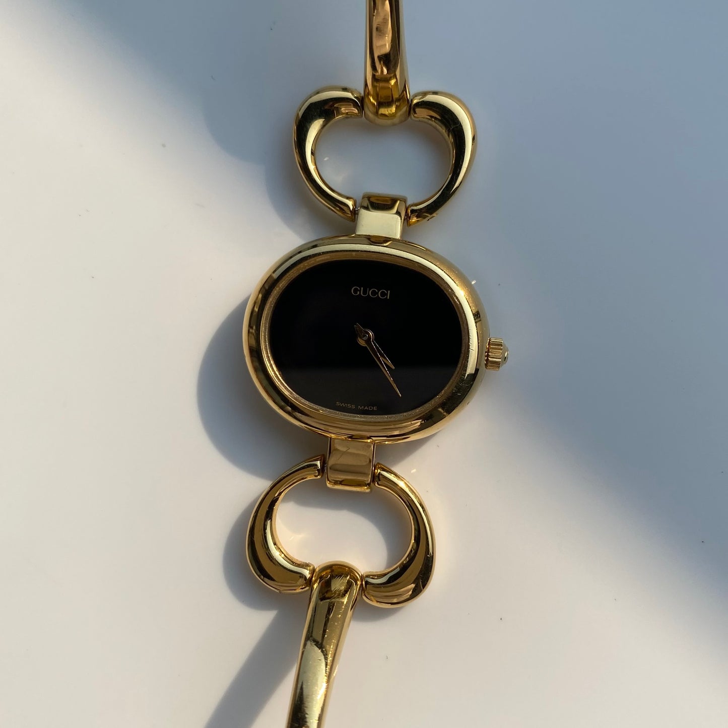 Gucci 1990s Black Dial Gold Plated Bangle Watch