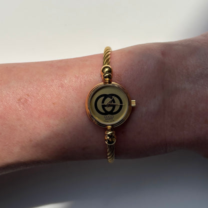 Gucci 1980s Round Dial Cable Band Bangle Watch