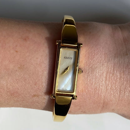 Gucci 1990s Rectangular Seashell Dial Gold Plated Bangle Watch