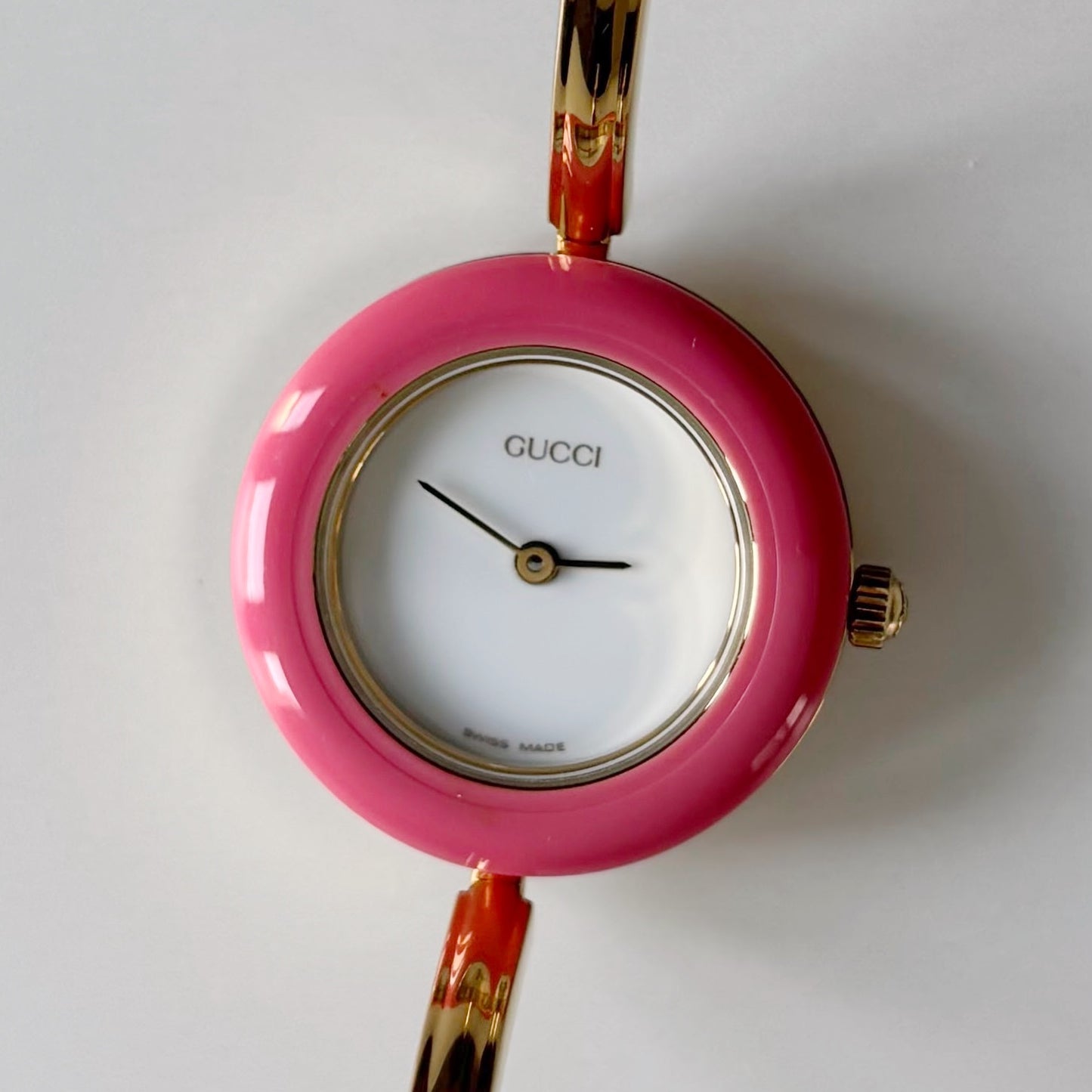 Gucci 1990s Interchangeable Bezel Gold Plated Bangle Watch with case, 12 bezels