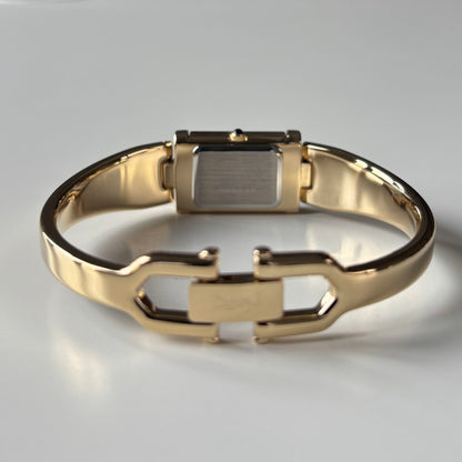 Yves Saint Laurent 1990s Peek-A-Boo Gold Plated Bangle Watch