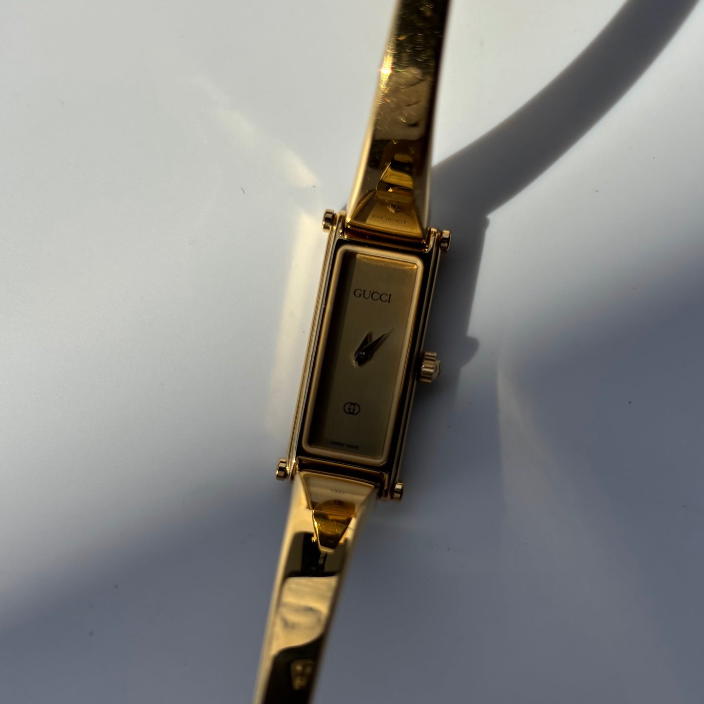 Gucci 1980s Rectangular Gold Dial Gold Plated Bangle Watch