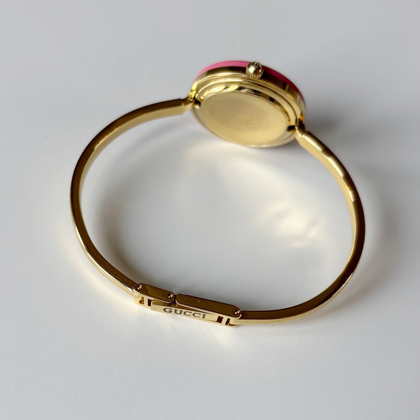 Gucci 1990s Interchangeable Bezel Gold Plated Bangle Watch with case, 12 bezels