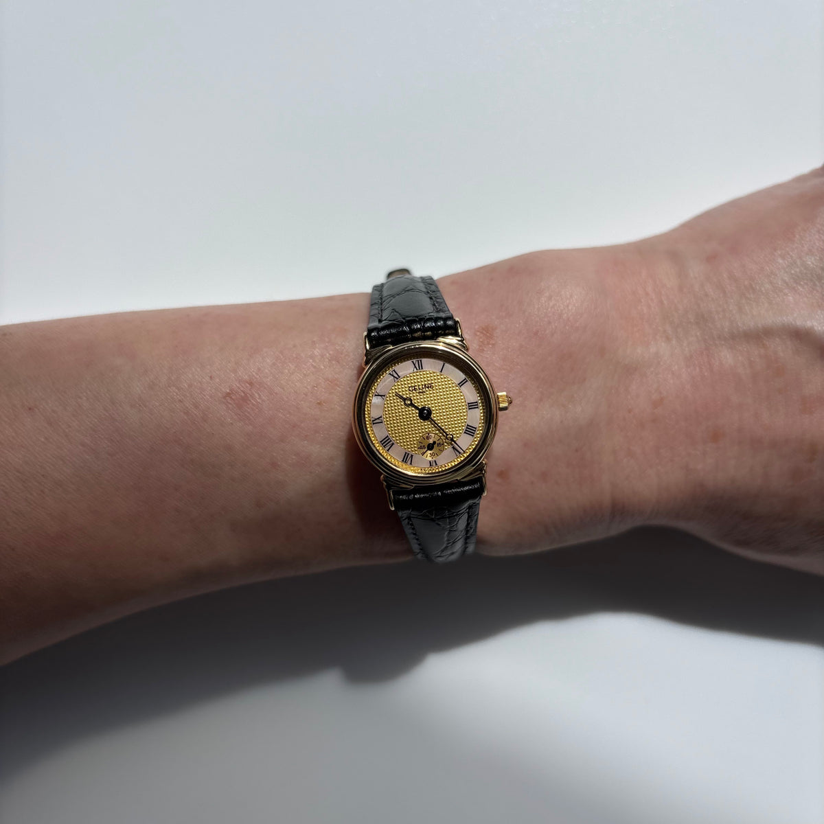 Celine 1980s Seashell Round Dial Gold Plated Watch