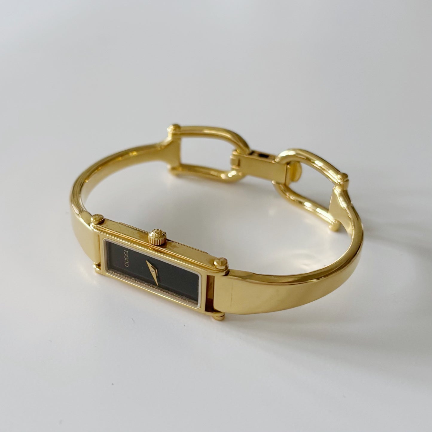 Gucci 1990s Black Dial Gold Plated Bangle Watch