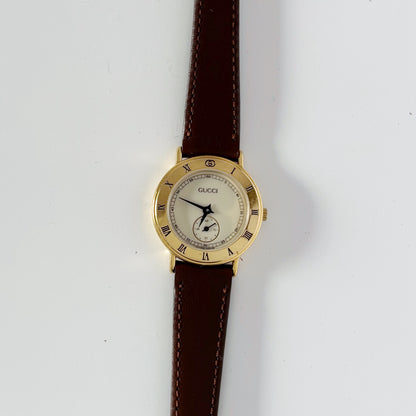 Gucci 1990s Round Dial Gold Plated Watch