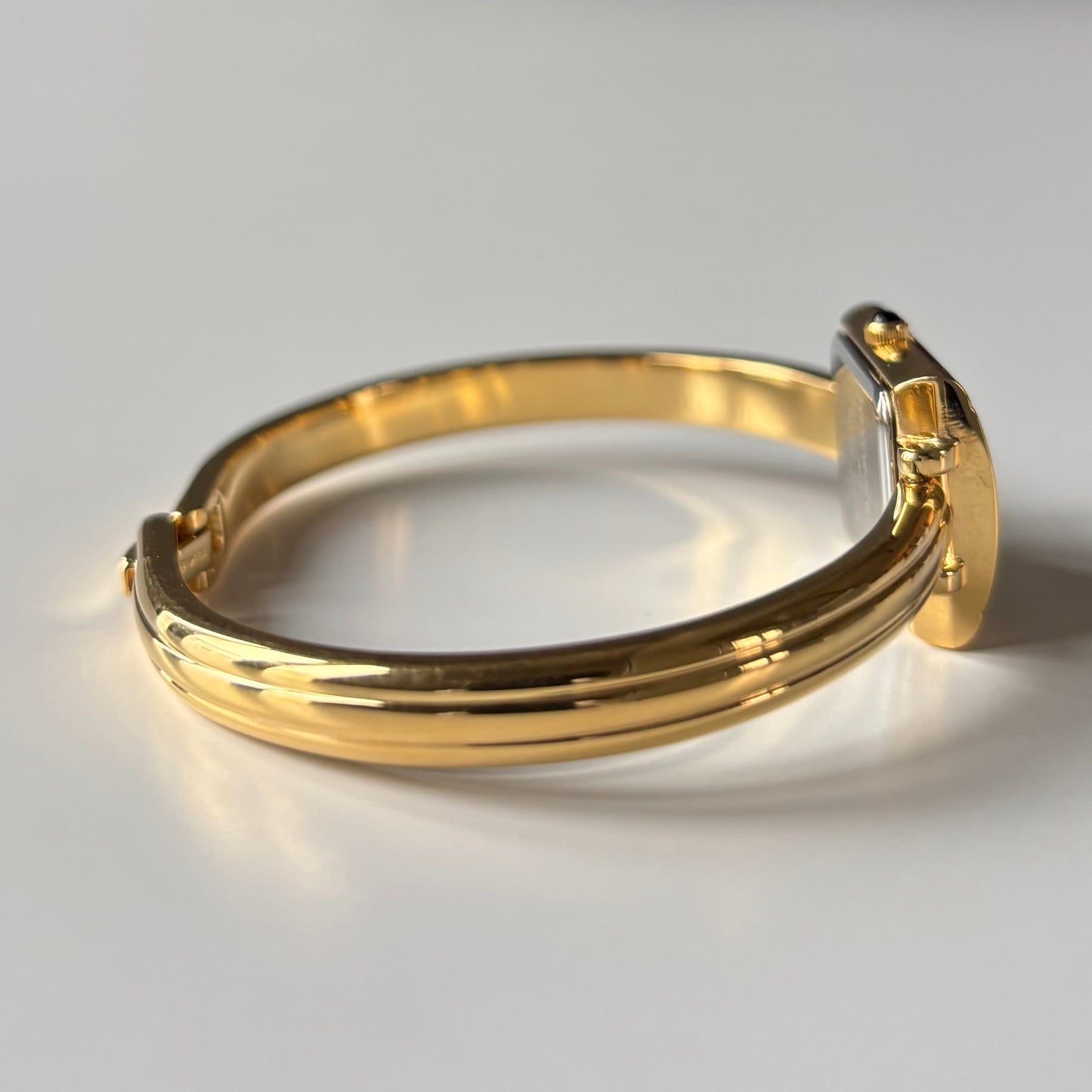 Yves Saint Laurent 1990s Seashell Dial Gold Plated Bangle Watch