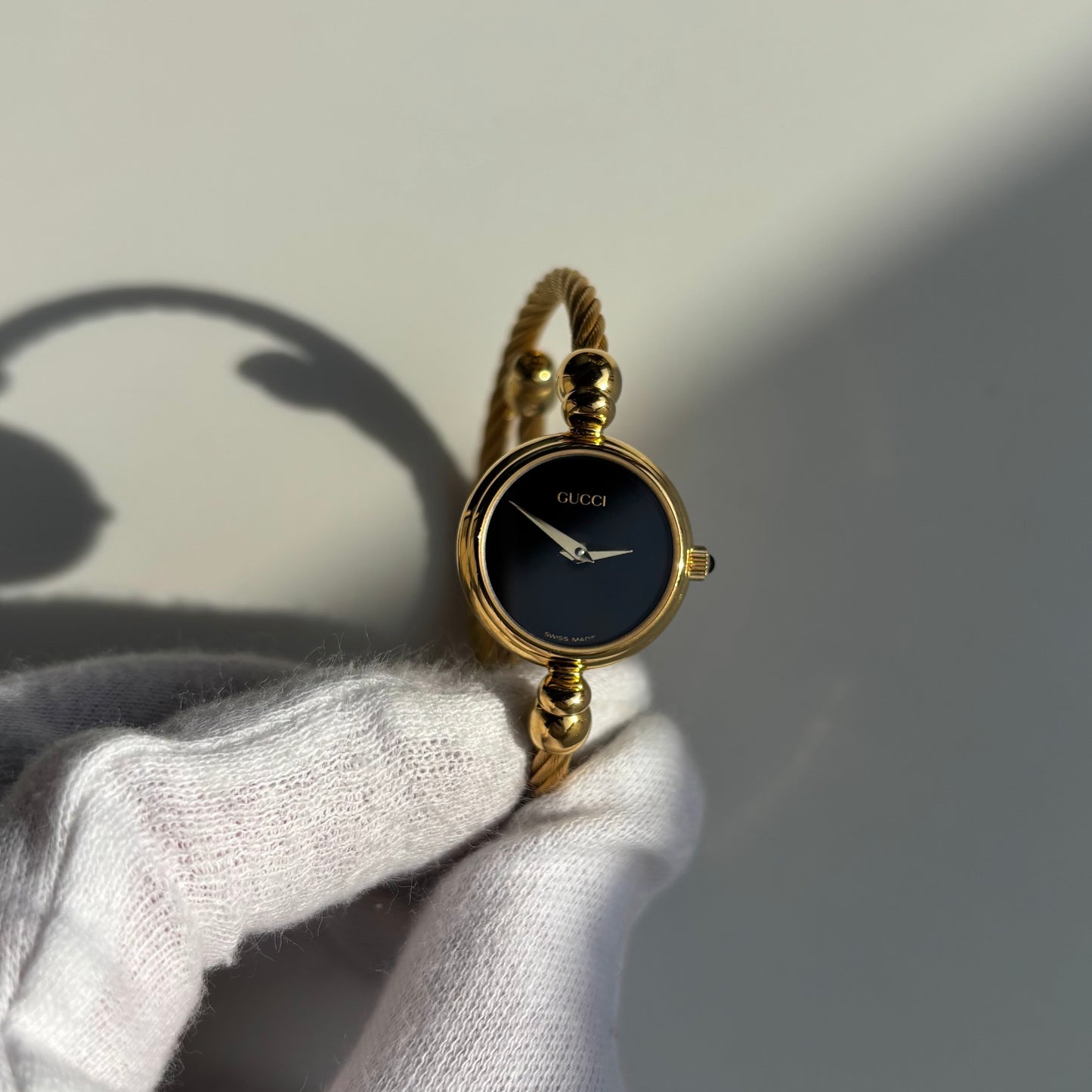 Gucci 1990s Black Dial Gold Plated Cable Band Bangle Watch