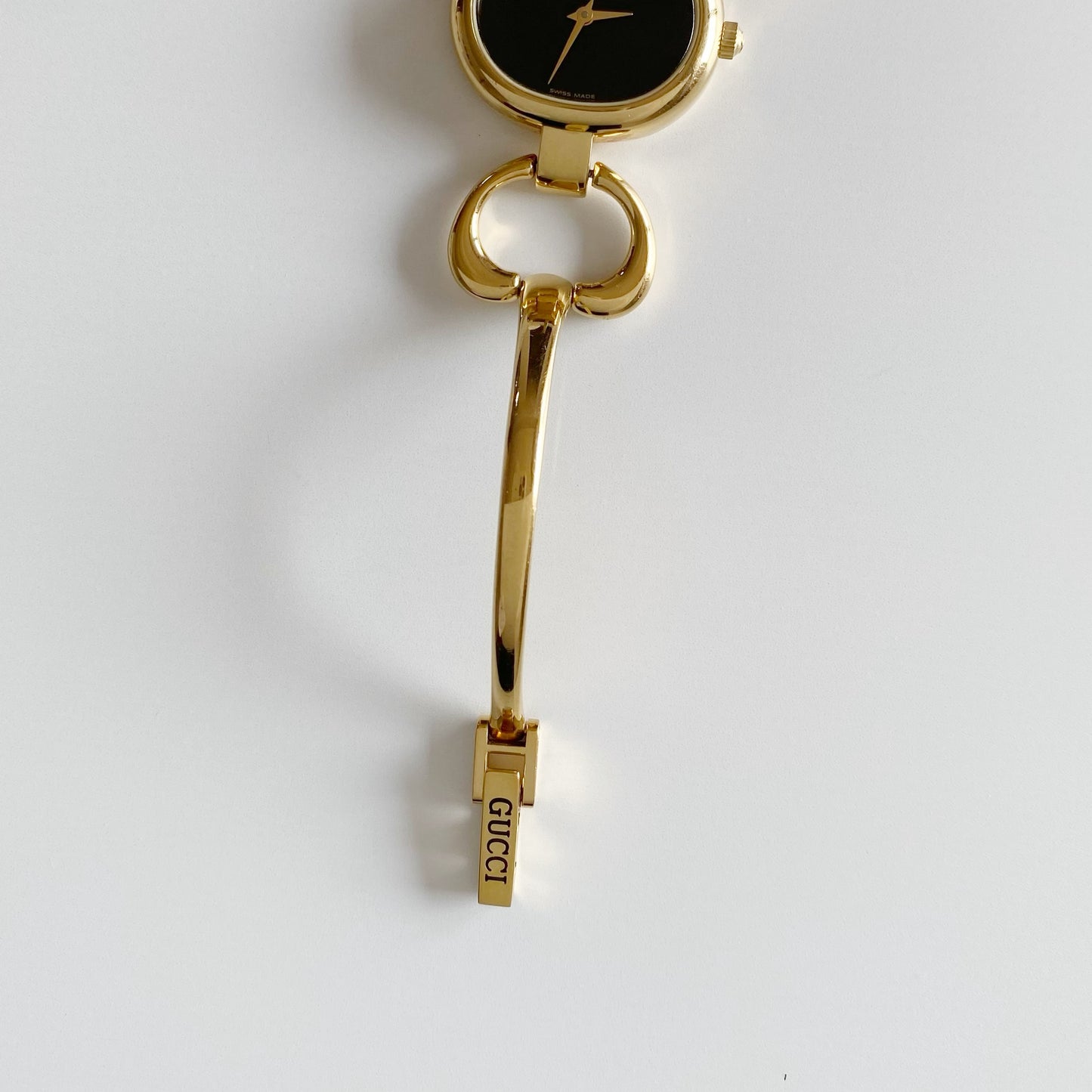 Gucci 1990s Black Dial Gold Plated Bangle Watch