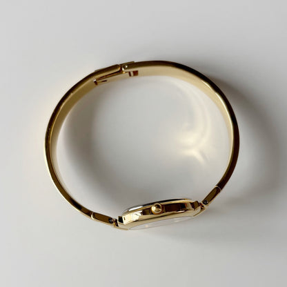 Givenchy 1990s Round Dial Gold Plated Bangle Watch