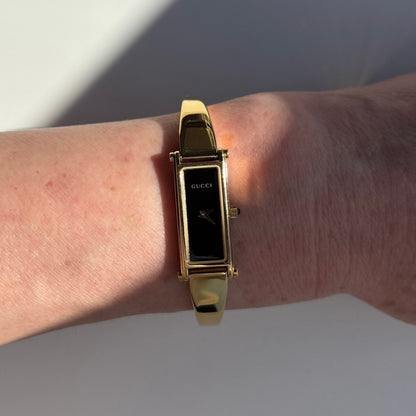 Gucci 1990s Black Dial Gold Plated Bangle Watch