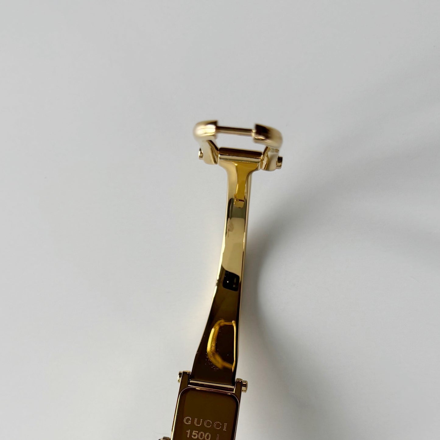 Gucci 1990s Gold Rectangular Dial Gold Plated Bangle Watch