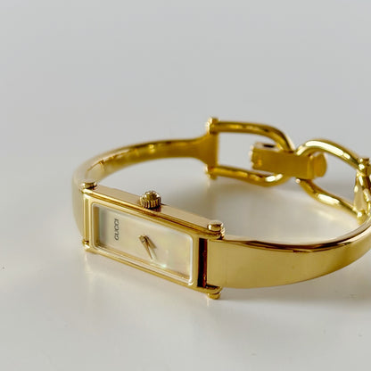 Gucci 1990s Seashell Rectangular Dial Gold Plated Bangle Watch