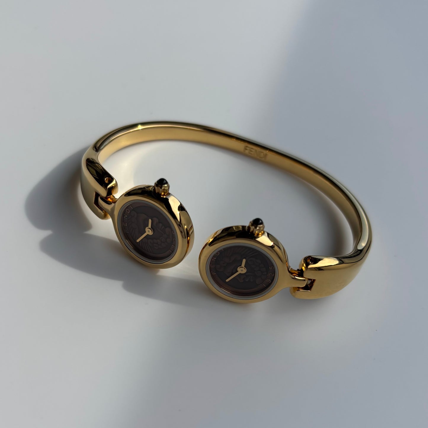 Fendi 1990s Seashell Dial Two Time Zone Gold Plated Bangle Watch