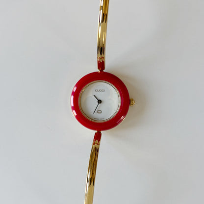 Gucci 1990s Interchangeable Bezel Gold Plated Bangle Watch with 12 bezels, case