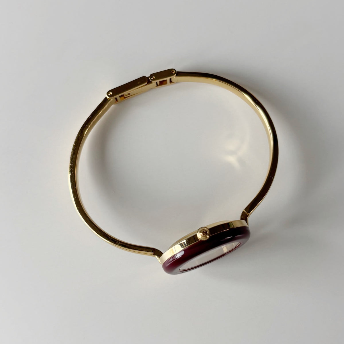 Gucci 1990s Interchangeable Bezel Gold Plated Bangle Watch with 12 bezels, case