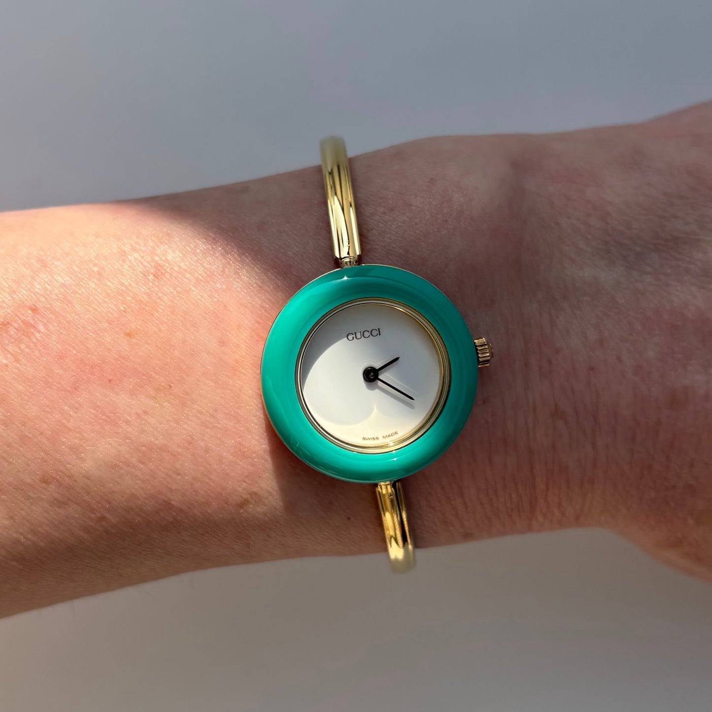 Gucci 1990s Interchangeable Bezel Gold Plated Bangle Watch with 12 bezels, case