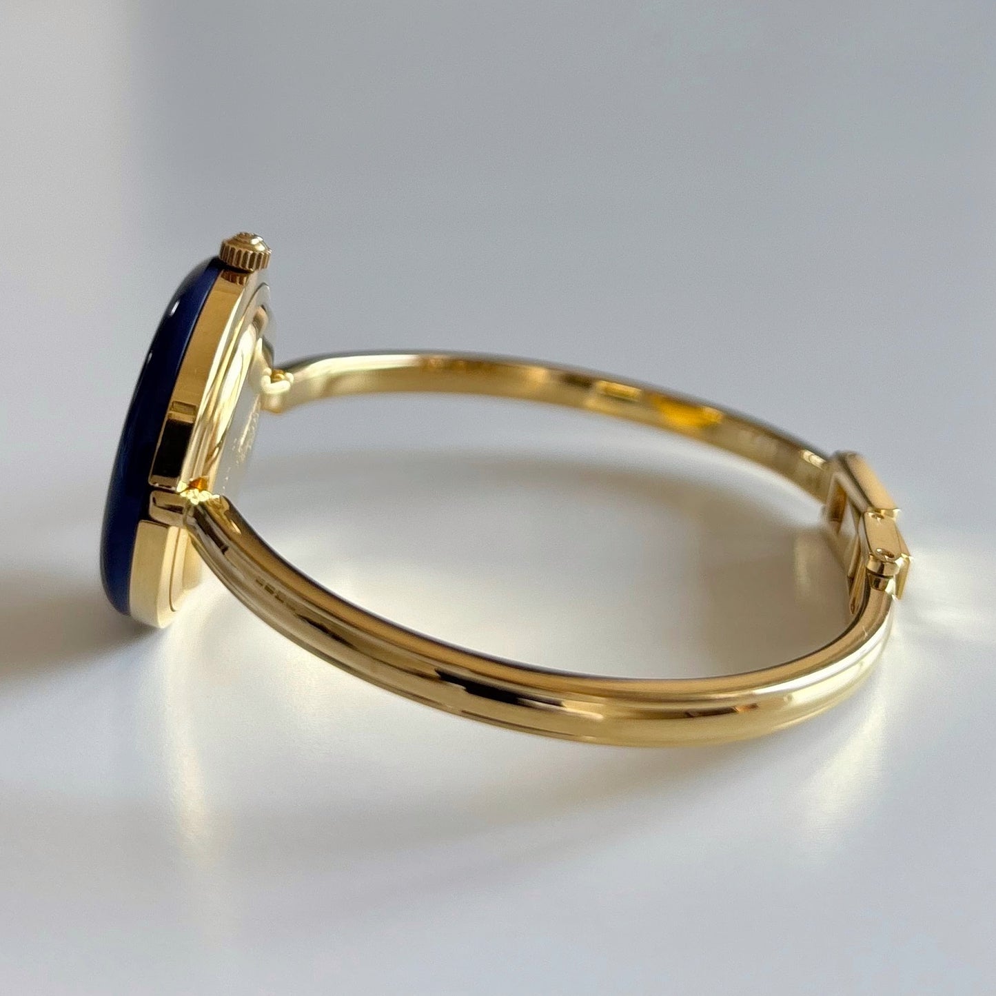 Gucci 1990s Interchangeable Bezel Gold Plated Bangle Watch with 12 bezels, case