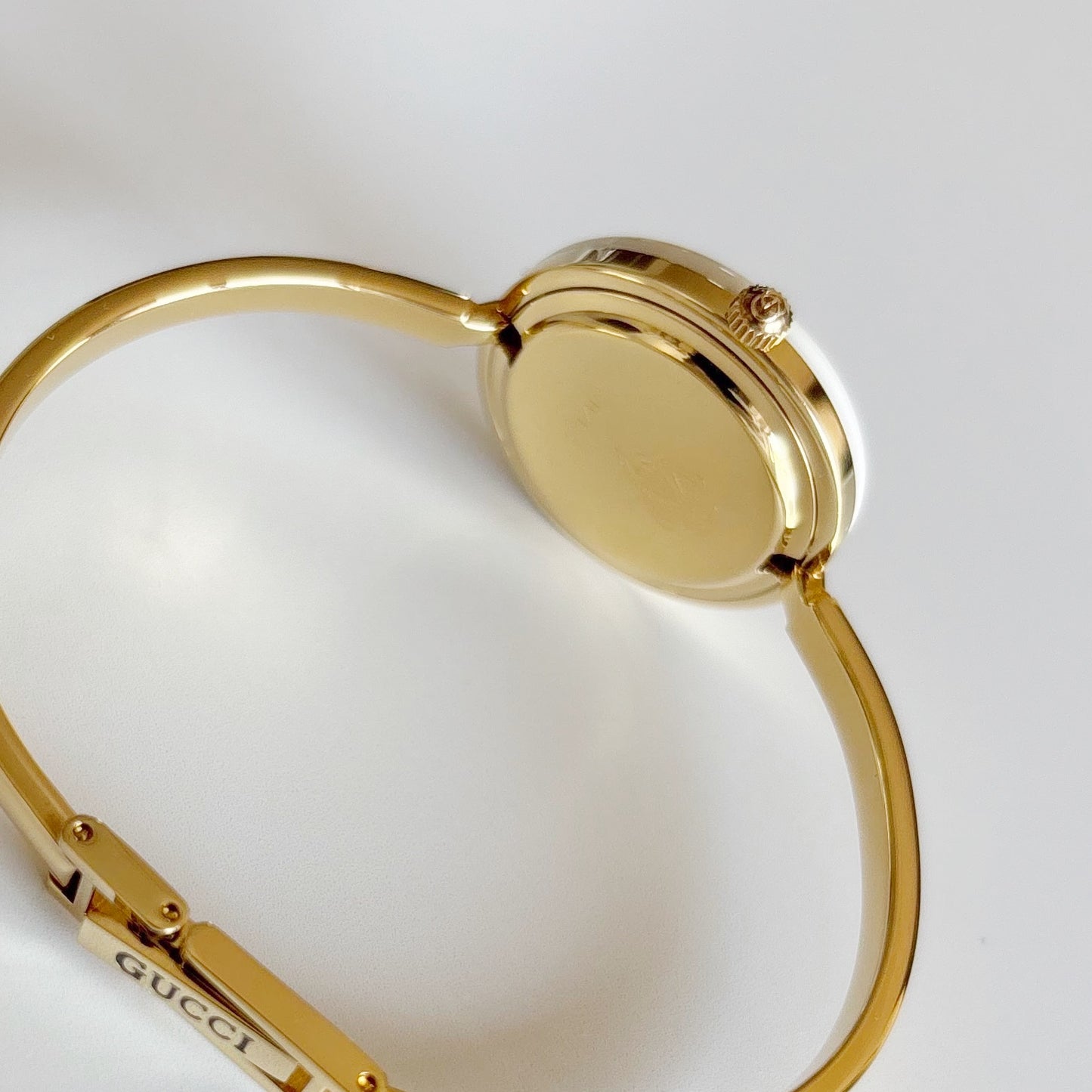 Gucci 1990s Interchangeable Bezel Gold Plated Bangle Watch with 12 bezels, case