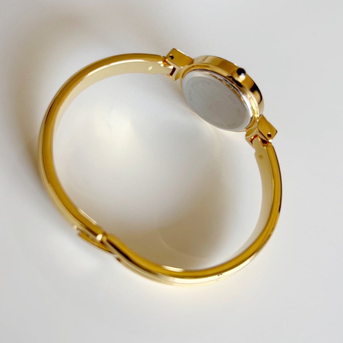 Yves Saint Laurent 1990s Seashell Dial Gold Plated Bangle Watch (Small)