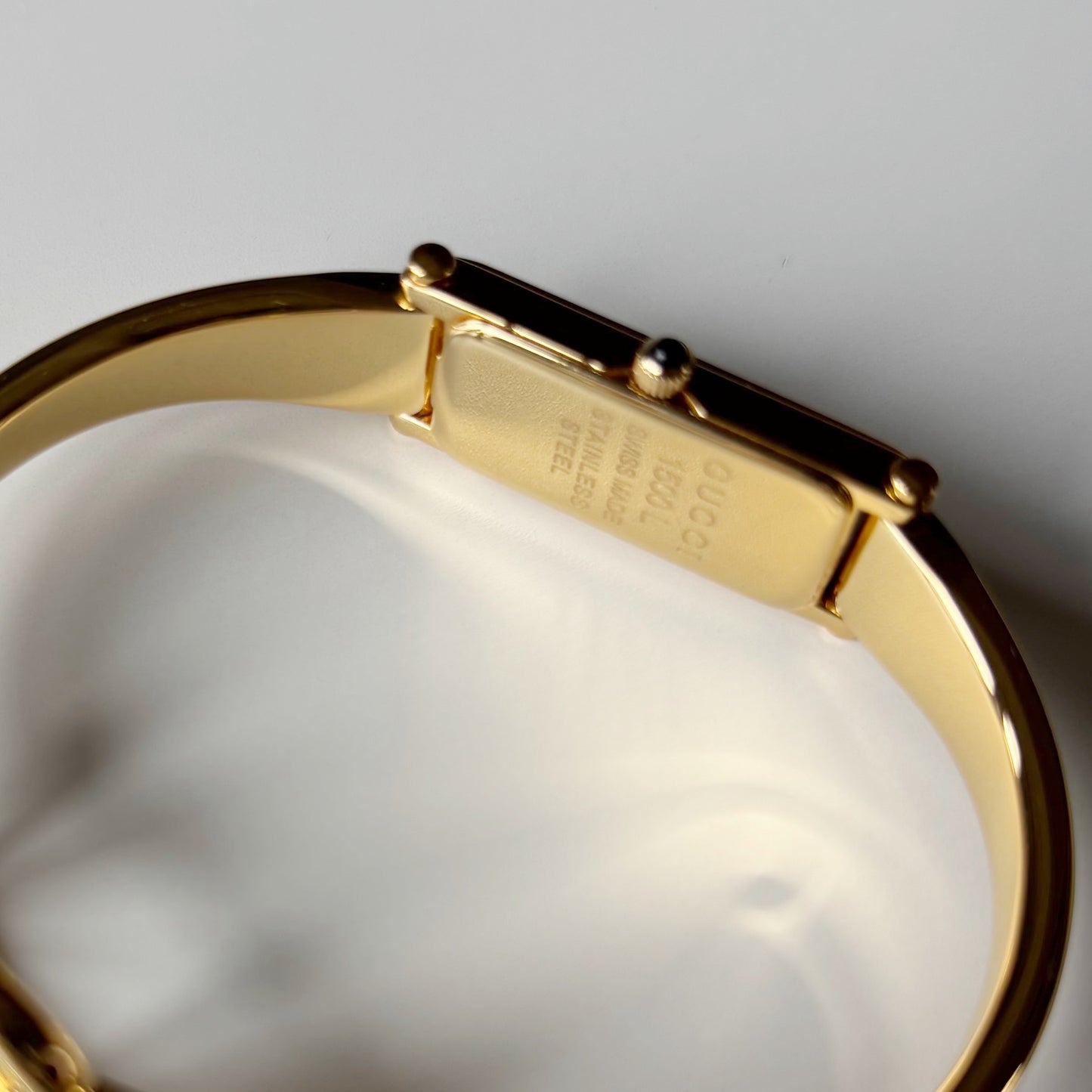 Gucci 1990s Seashell Rectangular Dial Gold Plated Bangle Watch