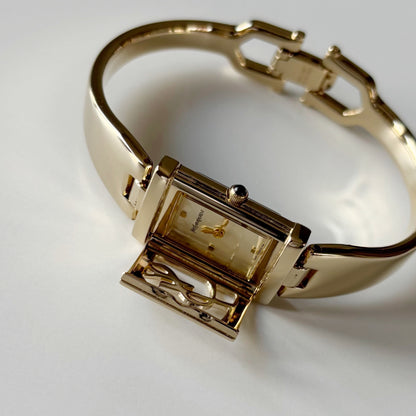 Yves Saint Laurent 1990s Peek-A-Boo Gold Plated Bangle Watch