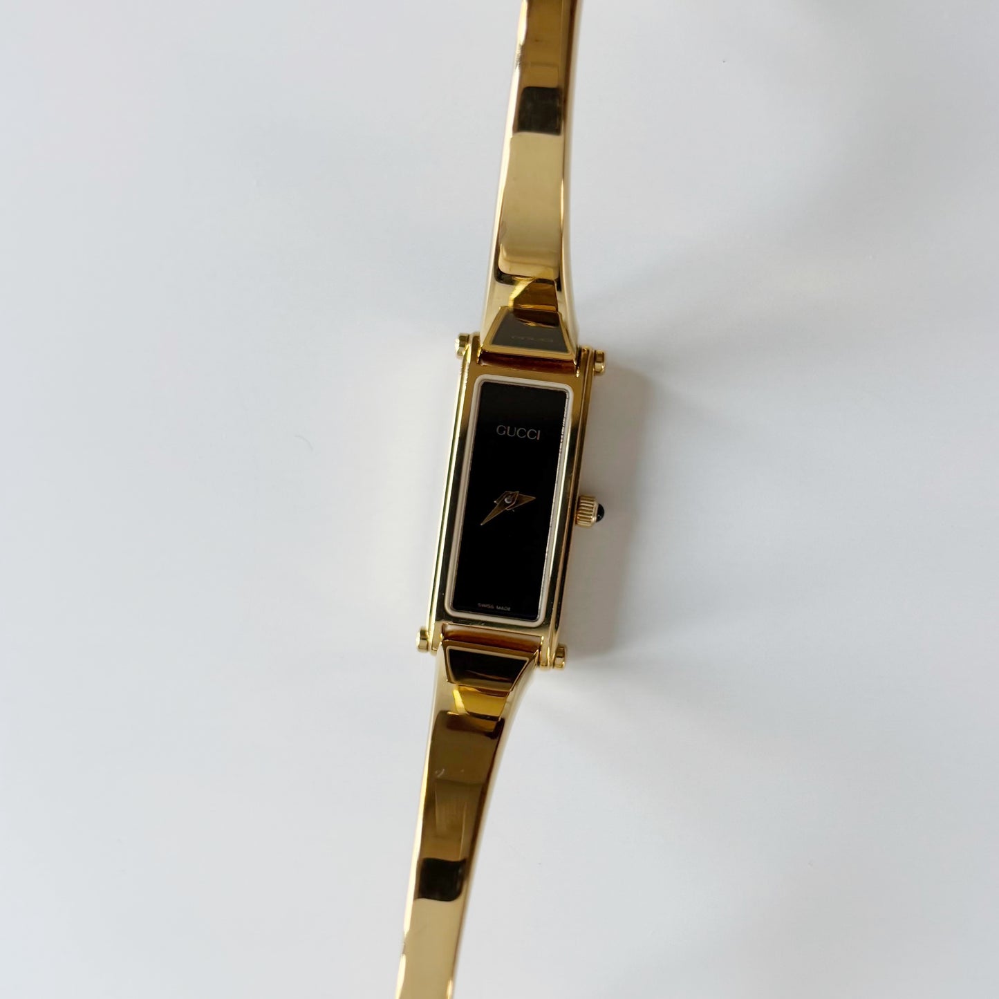 Gucci 1990s Black Dial Gold Plated Bangle Watch