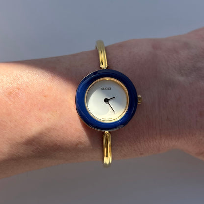 Gucci 1990s Interchangeable Bezel Gold Plated Bangle Watch with 12 bezels, case