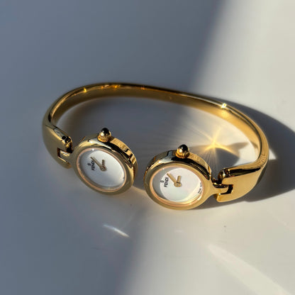Fendi 1990s Seashell Dial Two Time Zone Gold Plated Bangle Watch