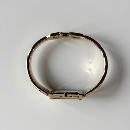 Yves Saint Laurent 1990s Peek-A-Boo Gold Plated Bangle Watch