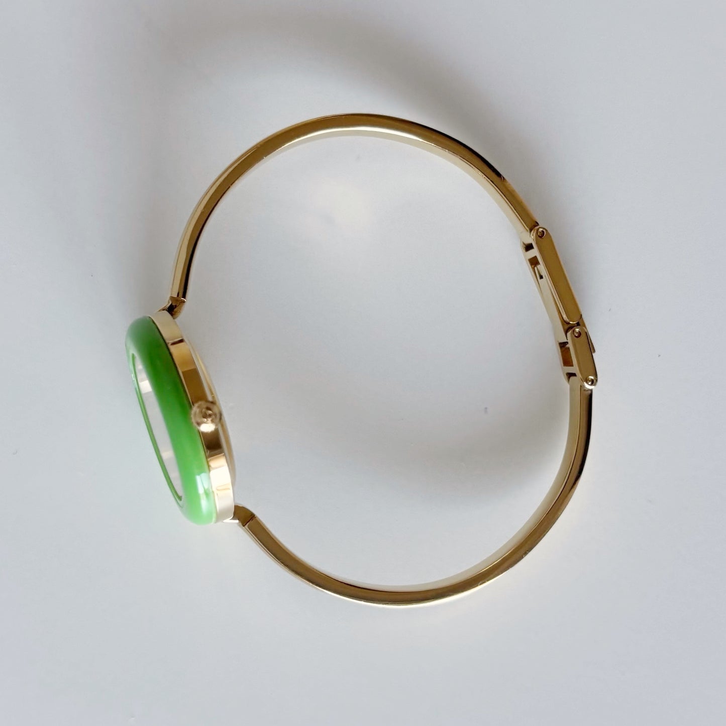 Gucci 1990s Interchangeable Bezel Gold Plated Bangle Watch with 12 bezels, case