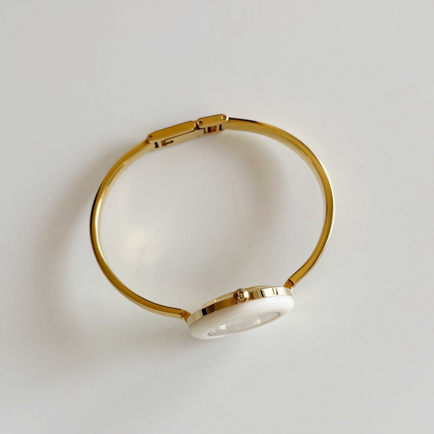 Gucci 1990s Interchangeable Bezel Gold Plated Bangle Watch with 12 bezels, case