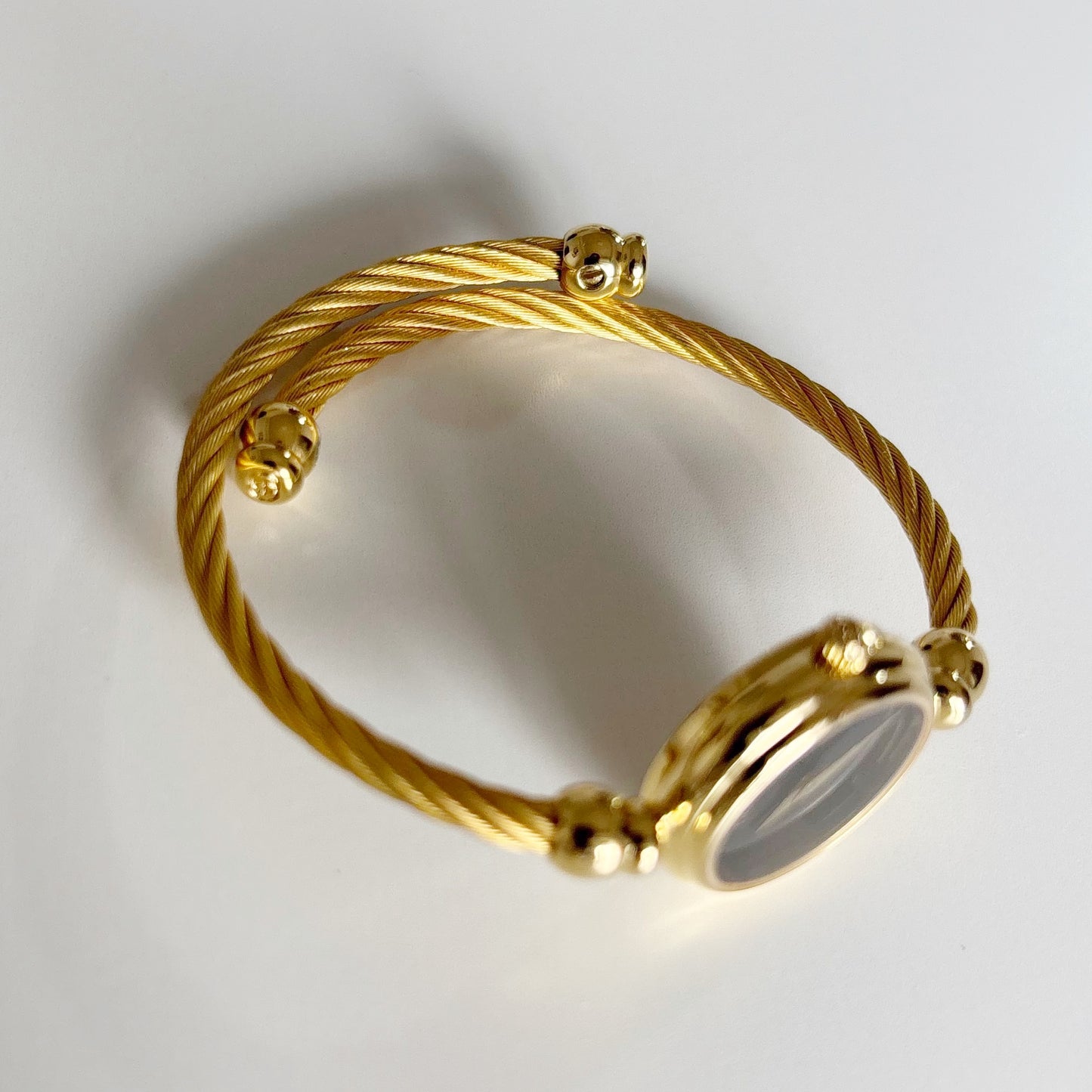 Gucci 1990s Black Dial Gold Plated Cable Band Bangle Watch