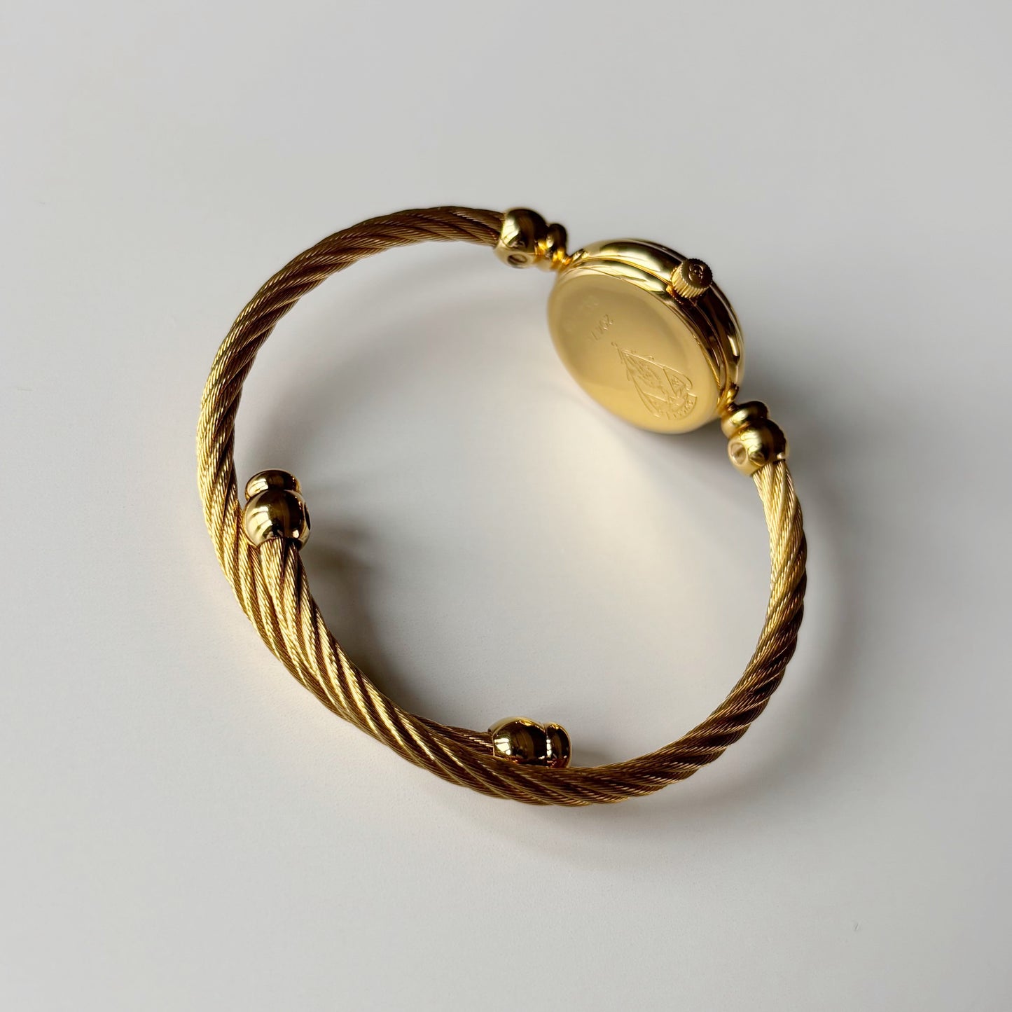 Gucci 1980s Round Dial Cable Band Bangle Watch