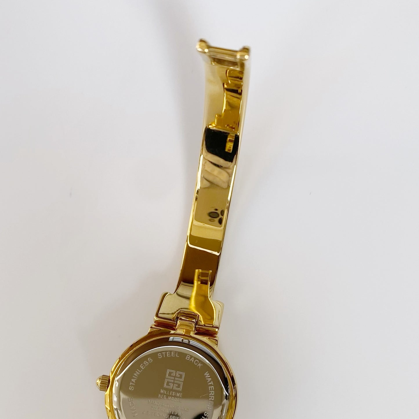 Givenchy 1990s Navy Dial Gold Plated Bangle Watch