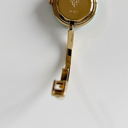 Gucci 1990s Interchangeable Bezel Gold Plated Bangle Watch with 12 bezels, case