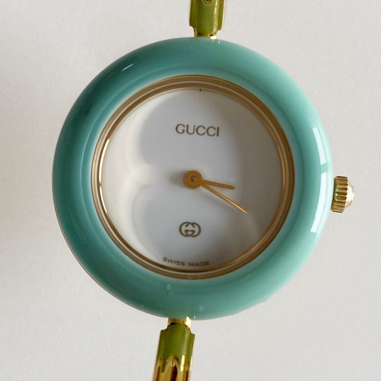 Gucci 1990s Interchangeable Bezel Gold Plated Bangle Watch with 12 bezels, case
