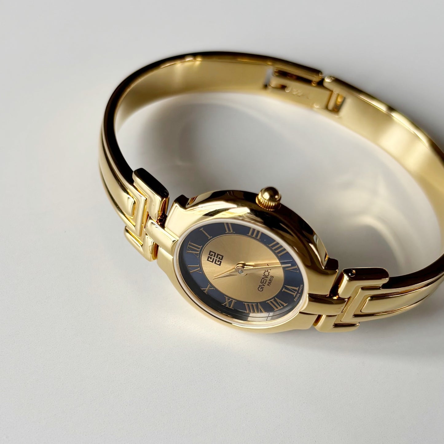 Givenchy 1990s Round Dial Gold Plated Bangle Watch