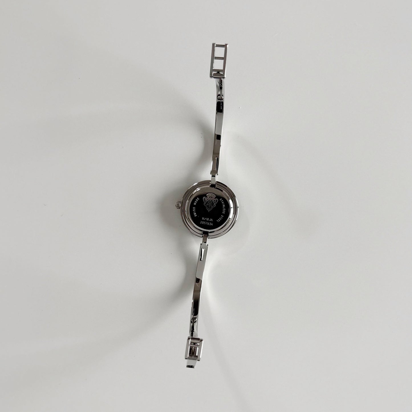 Gucci 1990s Interchangeable Bezel Stainless steel Bangle Watch with 12 bezels, case