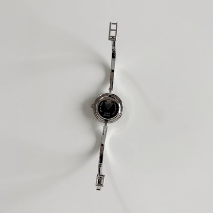 Gucci 1990s Interchangeable Bezel Stainless steel Bangle Watch with 12 bezels, case