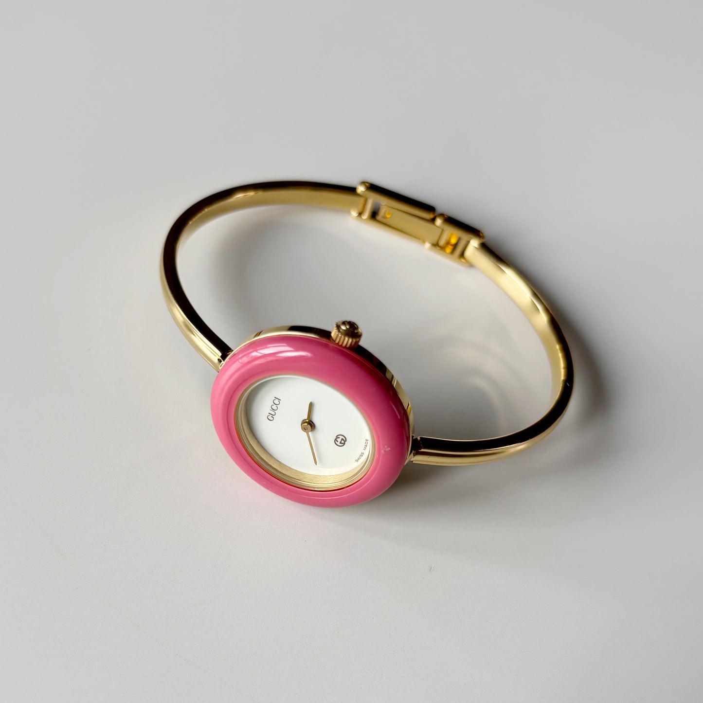 Gucci 1990s Interchangeable Bezel Gold Plated Bangle Watch with 12 bezels, case