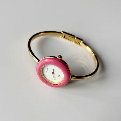 Gucci 1990s Interchangeable Bezel Gold Plated Bangle Watch with 12 bezels, case