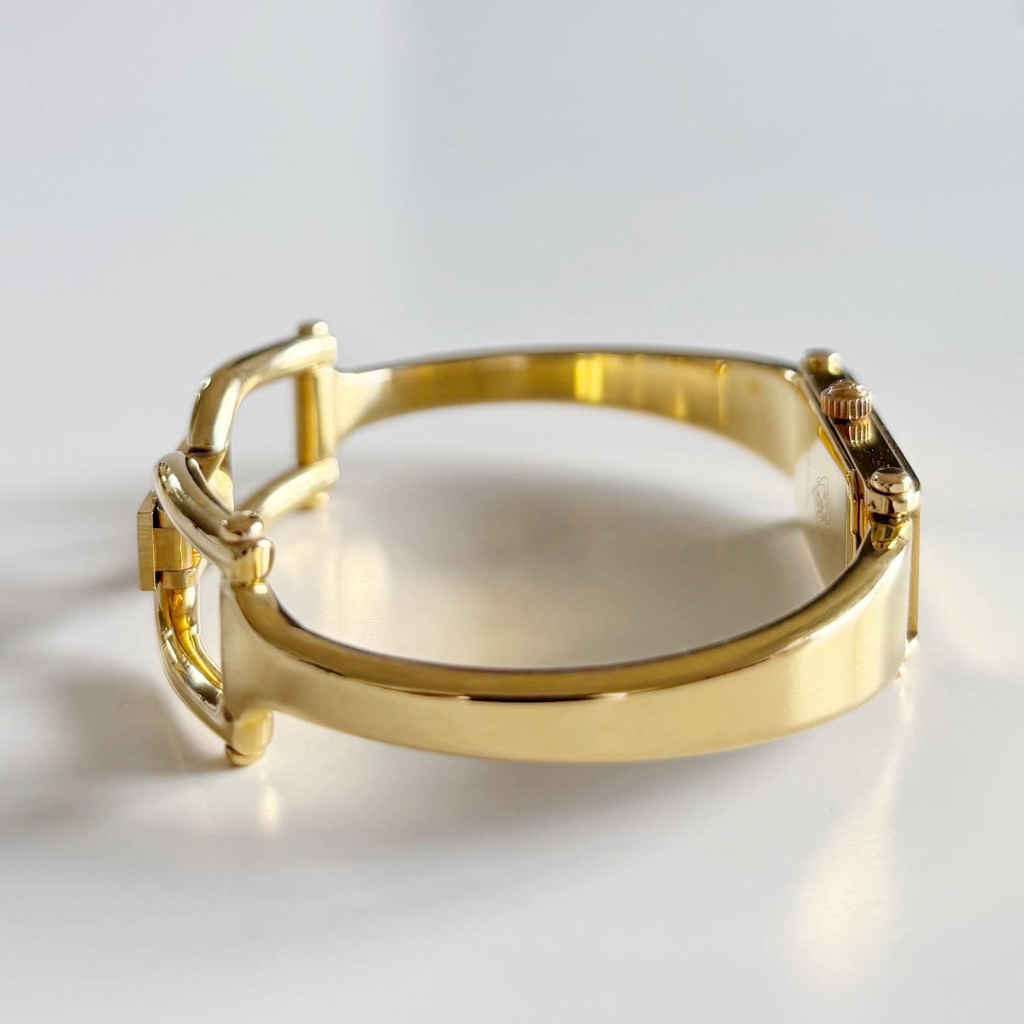 Gucci 1990s Gold Rectangular Dial Gold Plated Bangle Watch