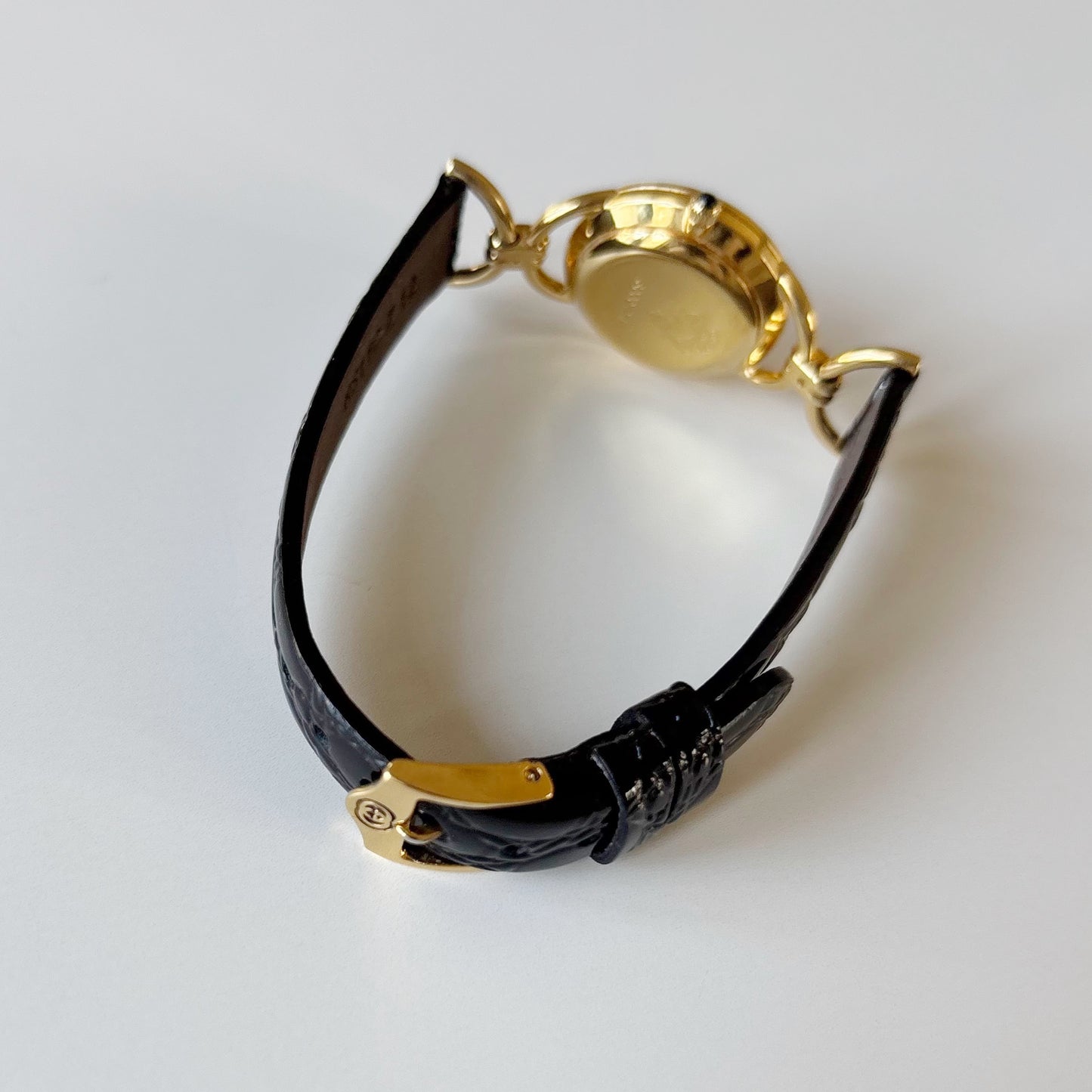 Gucci 1990s Black Round Dial Horsebit Gold Plated Watch